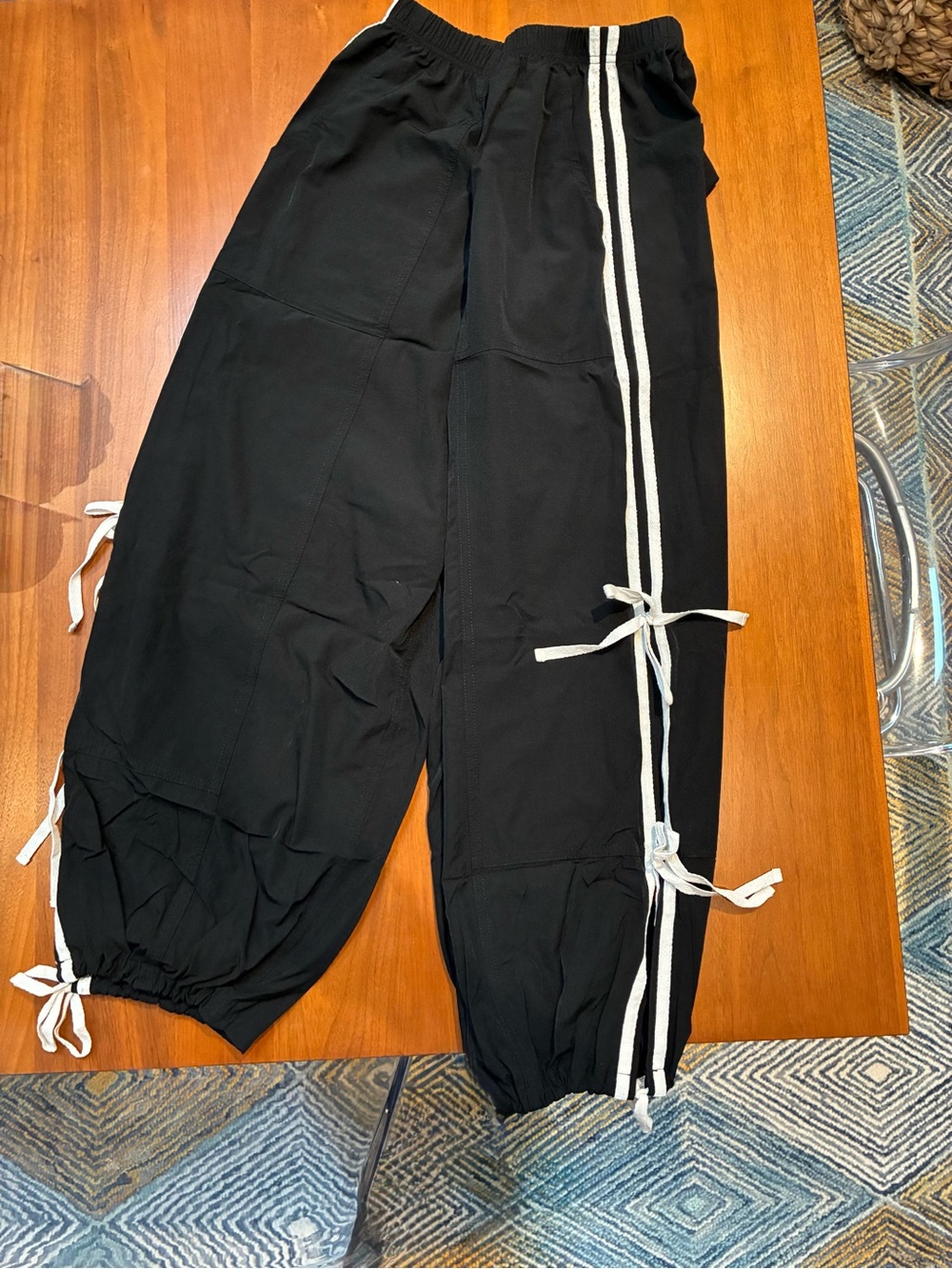 Women’s joggers. Black with white trim and bow detail 

Size S